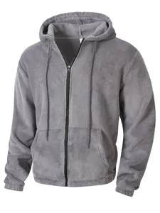 Macro view showing the soft plush fleece texture and hood details of this gray hoodie.