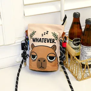 Close-up detail of the cute Capybara cartoon printed crossbody bucket bag with rope strap