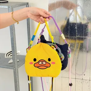Detailed view of vibrant Korean style cartoon duck and cat mini crossbody phone bags