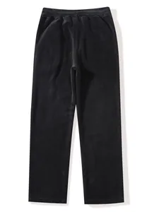 Detail view of warm black fleece men's lounge pants showing soft textured fabric