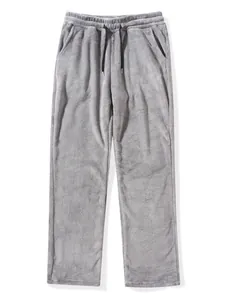 Close-up detail of grey thermal fleece lounge pants with adjustable black drawstring waist