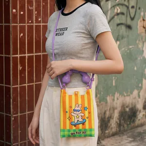Creative mini cartoon rabbit crossbody phone bag with purple handle and bright orange stripes