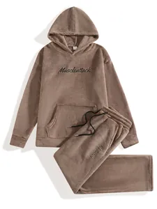 Full detail view of men's cozy fuzzy embroidered hoodie and pants loungewear set