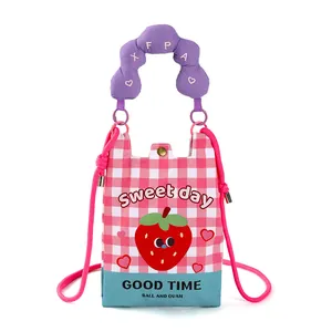 Front view of a pink gingham cartoon strawberry crossbody bag with puffy handle detail.