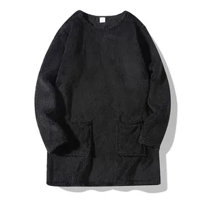 Cozy women's black fuzzy sweatshirt featuring front pockets and soft plush fleece texture.