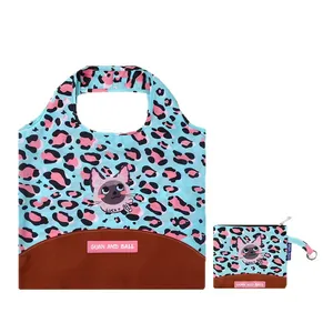 Cute foldable cyan leopard print shopping bag with cat graphic and matching zipper pouch