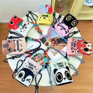 Detail view showing various colorful cartoon print crossbody bucket bags for women.
