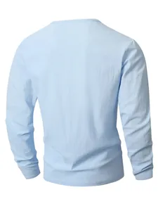 Back view detail of light blue long-sleeved linen shirt for men with breathable fabric