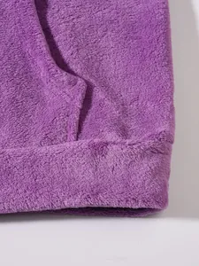 Close-up detail showing the soft purple fuzzy fleece texture of men's warm loungewear
