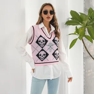 Close-up detail of Y2K pink knitted vest featuring an argyle skull pattern and V-neckline