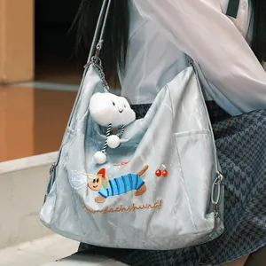 Bolso hobo azul claro estilo Harajuku con bordado de teckel y amuleto de nube suave.