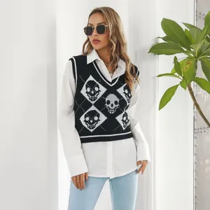 Detail view of the black and white skull pattern argyle knitted vest for women.