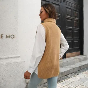 Side view of a stylish khaki turtleneck knitted vest worn over a white long-sleeve shirt.