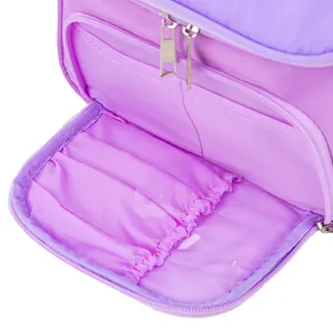 Detail view of purple pencil case interior featuring elastic pen slots and storage pockets