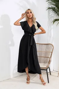 Elegant black ruffled V-neck sleeveless wrap maxi dress with belt in summer setting