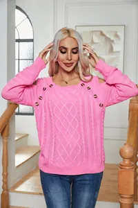 Pink cable knit sweater featuring decorative buttons and chic cold shoulder detail.