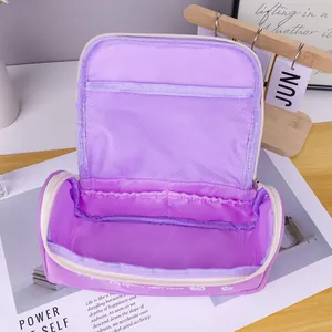 Interior detail of large capacity purple PU stationery pouch with mesh pocket