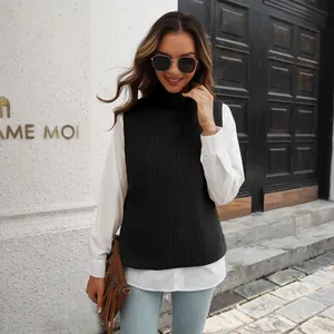 Stylish women's high collar knitted vest sweater layered over a crisp white shirt.