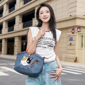 Süße japanische blaue Canvas-Handtasche mit Katzenstickerei für das tägliche Pendeln