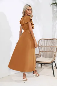 Back view of a ginger ruffle V-neck sleeveless maxi dress with a flowing swing hem