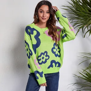 Vibrant lime green loose knit sweater with bold floral jacquard and drop shoulders.
