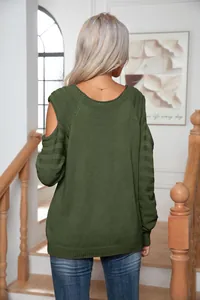 Back view detail of a stylish dark green women's cold-shoulder long sleeve knit sweater