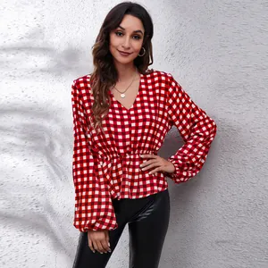 Elegant red and white gingham V-neck blouse with lantern sleeves and cinched waist design