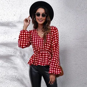 Red and white checkered V-neck blouse with lantern sleeves and a cinched waist design