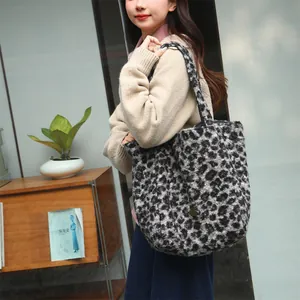 Large leopard print wool tote bag shown on model for casual and chic daily look