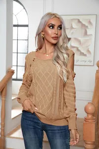 Full shot of woman in camel cable knit cold shoulder sweater with square neckline