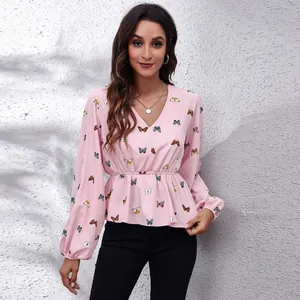 Elegant pink V-neck chiffon blouse with colorful butterfly print and lantern sleeves