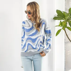 Detail view of women's wave-patterned jacquard knit sweater in a loose casual fit