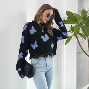 Stylish Y2K distressed cropped sweater featuring blue butterfly jacquard patterns
