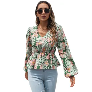 Elegant floral V-neck peplum chiffon blouse with lantern sleeves and tropical leaf print