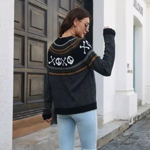 Detailed back view of women's Halloween ghost and vintage polka dot knit sweater in black