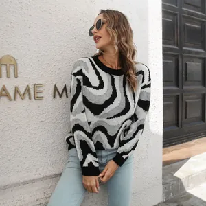 Stylish women's jacquard knit sweater featuring black and white abstract wavy patterns