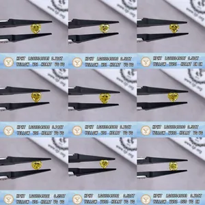 Detailed view of multiple IGI certified heart-shaped yellow lab-grown diamonds