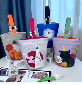 Artistieke canvas emmertassen met parelhandvat en unieke creatieve prints