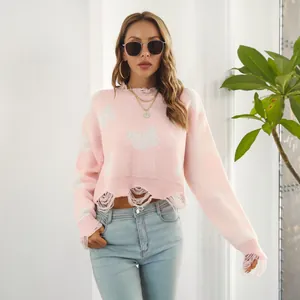 Y2K pink distressed butterfly jacquard knit sweater with cropped fit and long sleeves