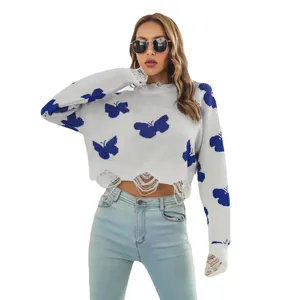 Women's Y2K distressed cropped sweater with blue butterfly jacquard and ripped hem