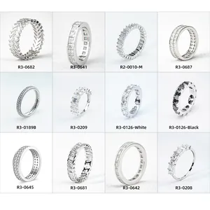 Selection of sterling silver eternity rings with various synthetic diamond cuts