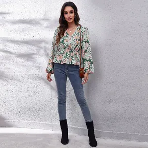 Elegant floral print V-neck blouse with lantern sleeves and cinched waist for women