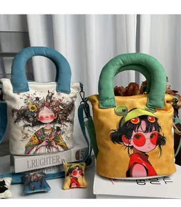 Cute canvas bucket bags with hand-drawn girl illustrations and colorful handles