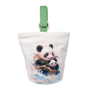 Canvas bucket bag featuring a cute watercolor panda print with green strap handle