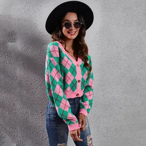 Detailed view of a colorful argyle check pattern knitted cardigan featuring a stylish cropped fit.
