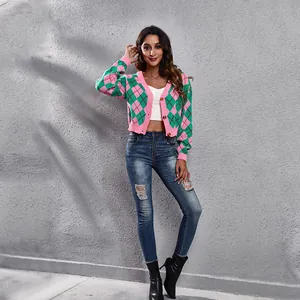 Stylish women's cropped argyle knit cardigan in vibrant pink and green color block.