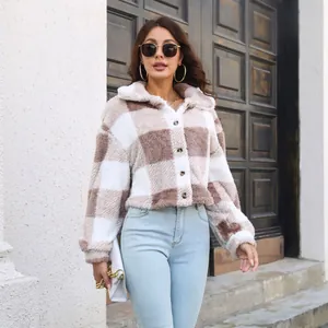 Stylish plaid plush jacket featuring oversized lantern sleeves and cozy winter texture