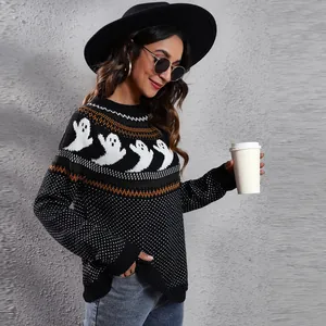 Detail view of women's Halloween ghost knit sweater with retro pattern and loose fit