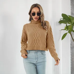 Detailed view of women's khaki cable knit turtleneck cropped sweater showing thick knit texture