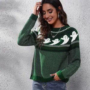 Woman wearing a dark green Halloween ghost patterned polka dot knitted sweater